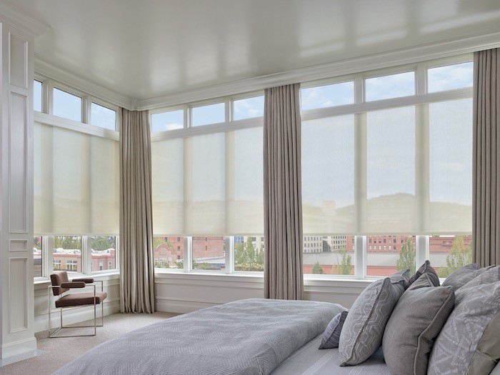 Bedroom with views and translucent shades